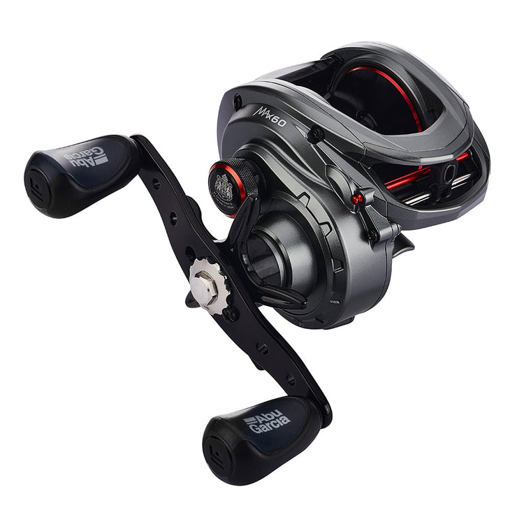 A black and silver fishing reel with dual handles, red accents, and visible branding. The design is sleek and modern, combining metallic and matte finishes with ergonomic handle grips.