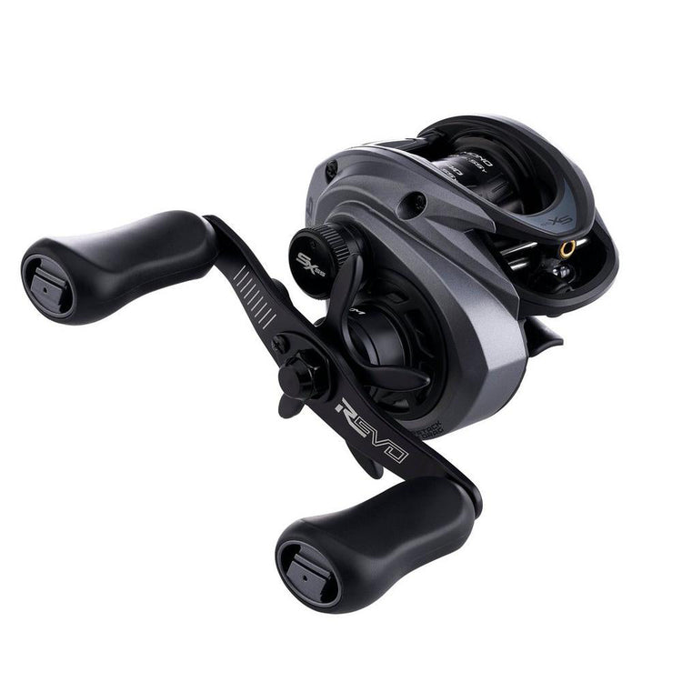 A sleek, metallic fishing reel with ergonomic black handles, displaying a modern design. The reel features a prominent logo and multiple adjustment knobs, emphasizing functionality and style.