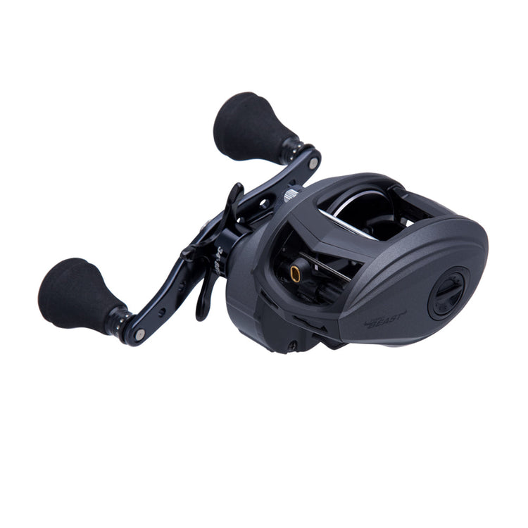 A black and silver fishing reel with two handles on each side. The reel has a sleek, rounded design with visible spools and mechanisms.