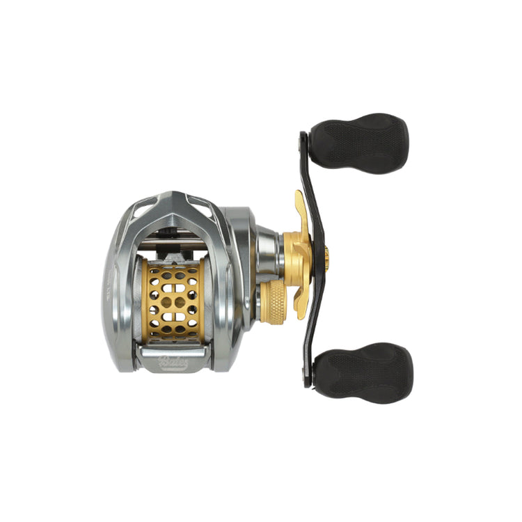 A silver and gold baitcasting fishing reel with black handles. The reel features a perforated spool and a compact design, viewed from the side against a white background.