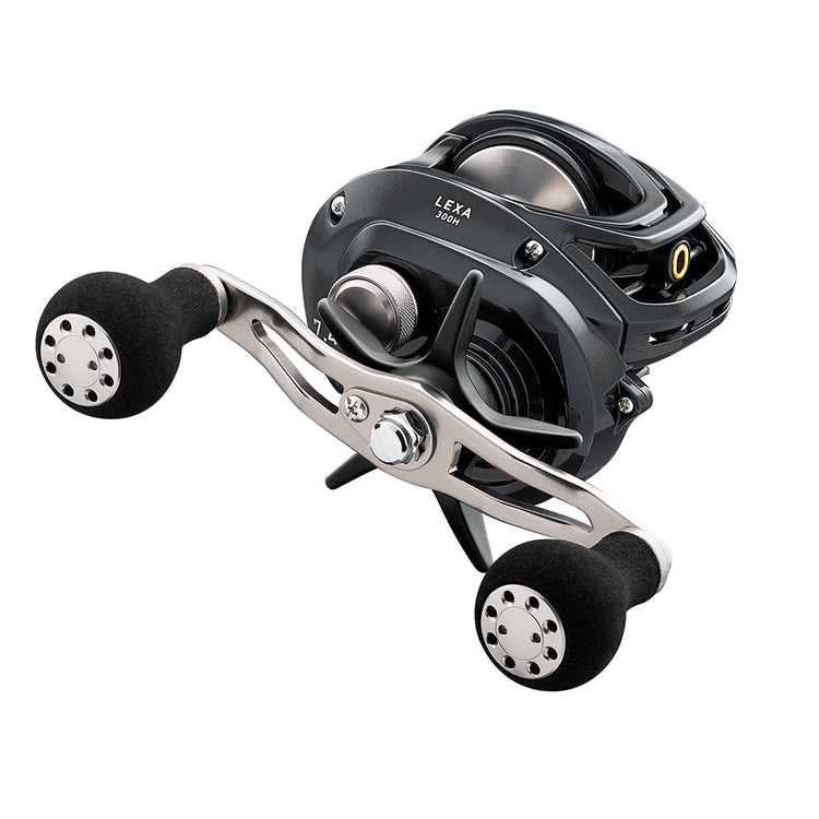 A black and silver fishing reel with dual handles and a modern design, featuring a smooth finish and detailed components.