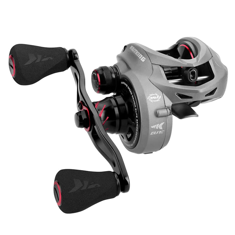 Gray fishing reel with black grips and red accents, featuring a smooth, ergonomic design. The reel has multiple adjustment knobs and a sleek, modern appearance.