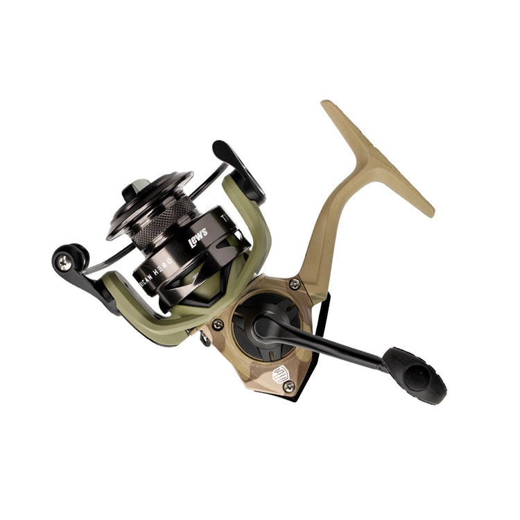 Fishing reel with a green and black finish, featuring a handle on the right side and a spool in the center. The reel has a modern design with a metallic and matte texture.