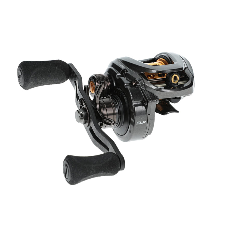 A black and gold baitcasting reel with ergonomic handles and a sleek design, showing dials and components.