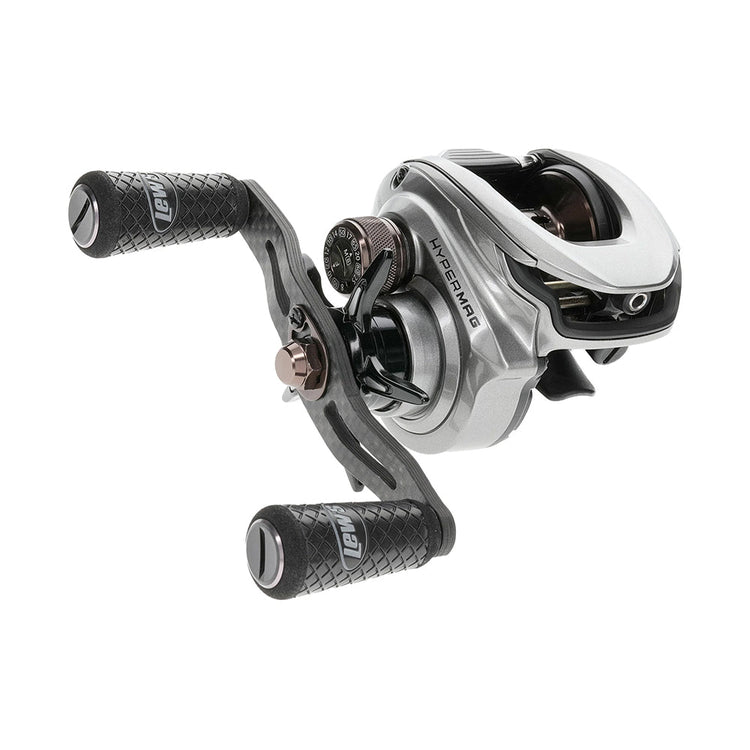 A silver baitcasting fishing reel with dual black, textured handles and visible spool adjustments. The reel's body features engraved branding, and it has a compact, ergonomic design suitable for right-hand use.