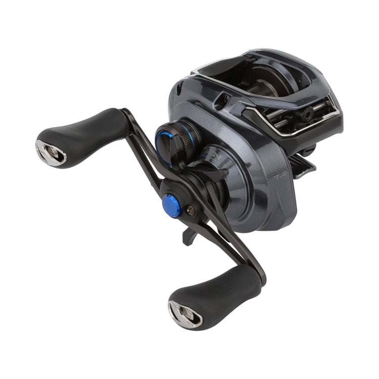 A close-up of a black and silver fishing reel with a blue accent. The reel features two ergonomic handles and a compact design.