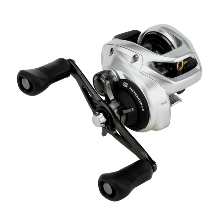 A silver fishing reel with black handles on a sleek black frame, featuring metallic accents and detailed components. The reel is positioned against a plain white background.