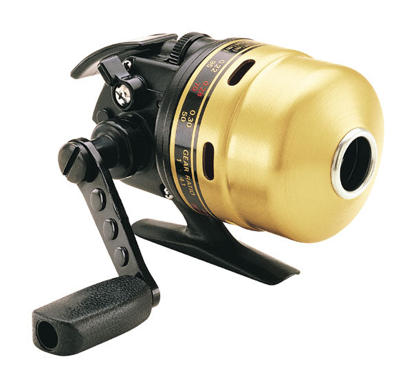 Gold-colored closed-face fishing reel with a black handle and mount. The reel has a visible red and yellow line guide and markings. The handle features a grip and a curved lever for operation.