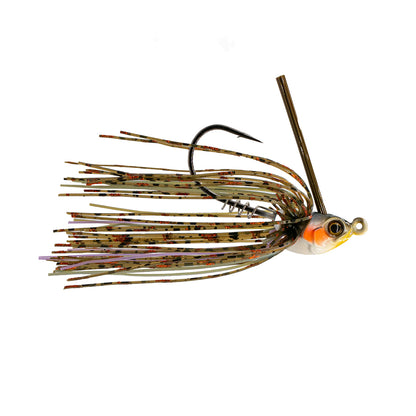 The 6th Sense Konda Finesse Swim Jig, with an orange and white head, sharp hook, and a multi-colored skirt featuring green and black strands, is crafted to mimic bait. The image showcases this swim jig against a plain white background.