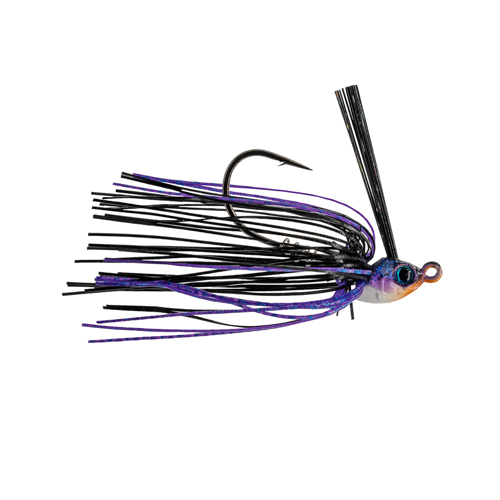 Introducing the 6th Sense Konda Finesse Swim Jig, a fishing lure designed to mimic fish with precision. It features a multicolored body of blue, black, and purple strands, a sharp hook, and an added thin strand on top for an enticing underwater dance.