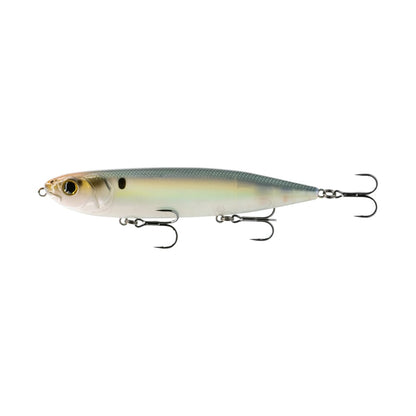 The 6th Sense Magnum Catwalk is a lifelike baitfish-imitating lure with a silver-green gradient body, black eyes, and three treble hooks on its underside and tail, boasting a premium paint scheme for an enticing catch.