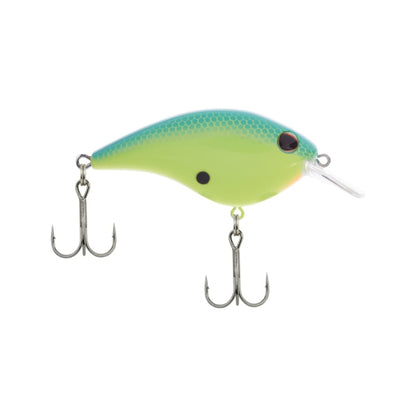 The image features the Berkley Frittside Crankbait, an excellent choice for bass fishing. It boasts a vibrant green and blue body with a detailed scale pattern, red eyes, and two treble hooks. A transparent bill graces the front, perfect for those seeking authentic balsa actions in their lures.