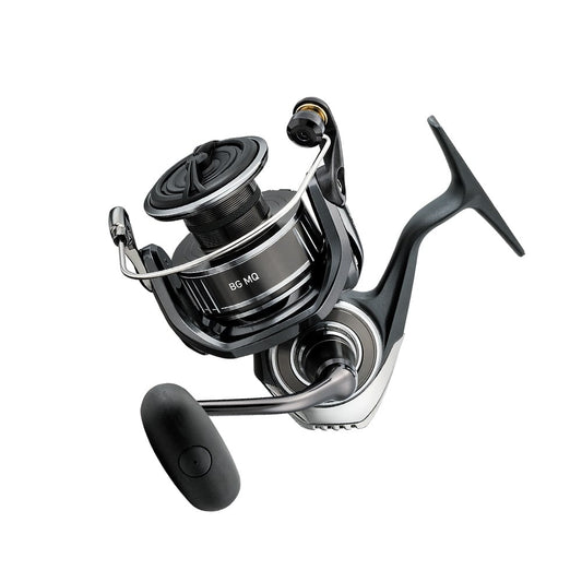 The Daiwa BG MQ 2500D-H Spinning Reel features a monocoque aluminum body with a stylish black and silver finish. Its large handle and durable metal frame suit saltwater fishing, while the spool and visible rotor arm stand out against a white backdrop, enhancing its modern look.