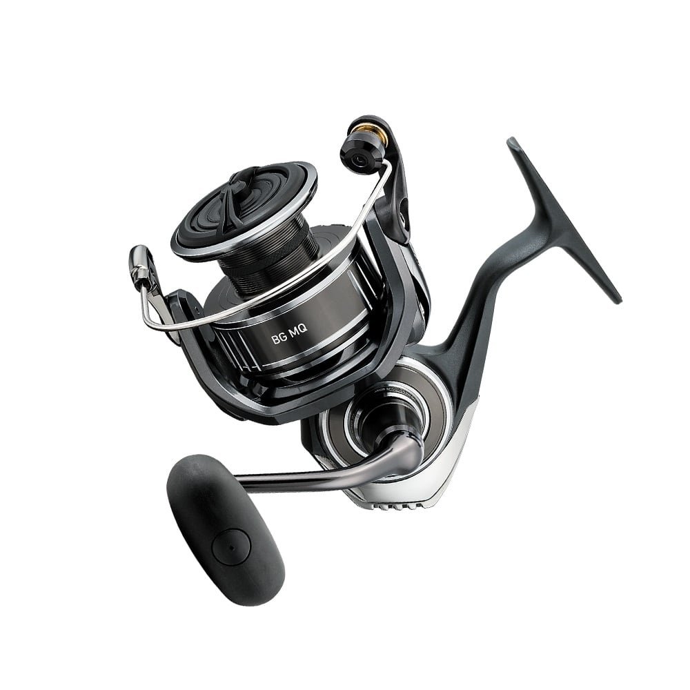 The Daiwa BG MQ 3000D-XH 6.2:1 Spinning Reel features a monocoque body and metallic design, a smooth crank handle, and is predominantly black with sleek silver accents for ergonomic fishing.