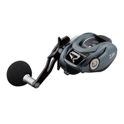 The Daiwa Lexa TW Casting Reel 300H-P 7.1:1 | LX-TW300H-P is a compact, sleek baitcasting reel with a sophisticated design. It features the T-Wing System, a metallic gray finish, and a large black handle with a cushioned grip, showcasing its mechanical parts and ergonomic casing.