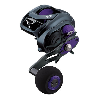 The Daiwa Prorex TW Casting Reel Left Hand 5.3:1, model PRX400PL-P, is stylishly designed for musky fishing with a large black-grip handle, visible gears, and metallic exterior. It features angular shapes and smooth finishes in a sleek black and purple design.