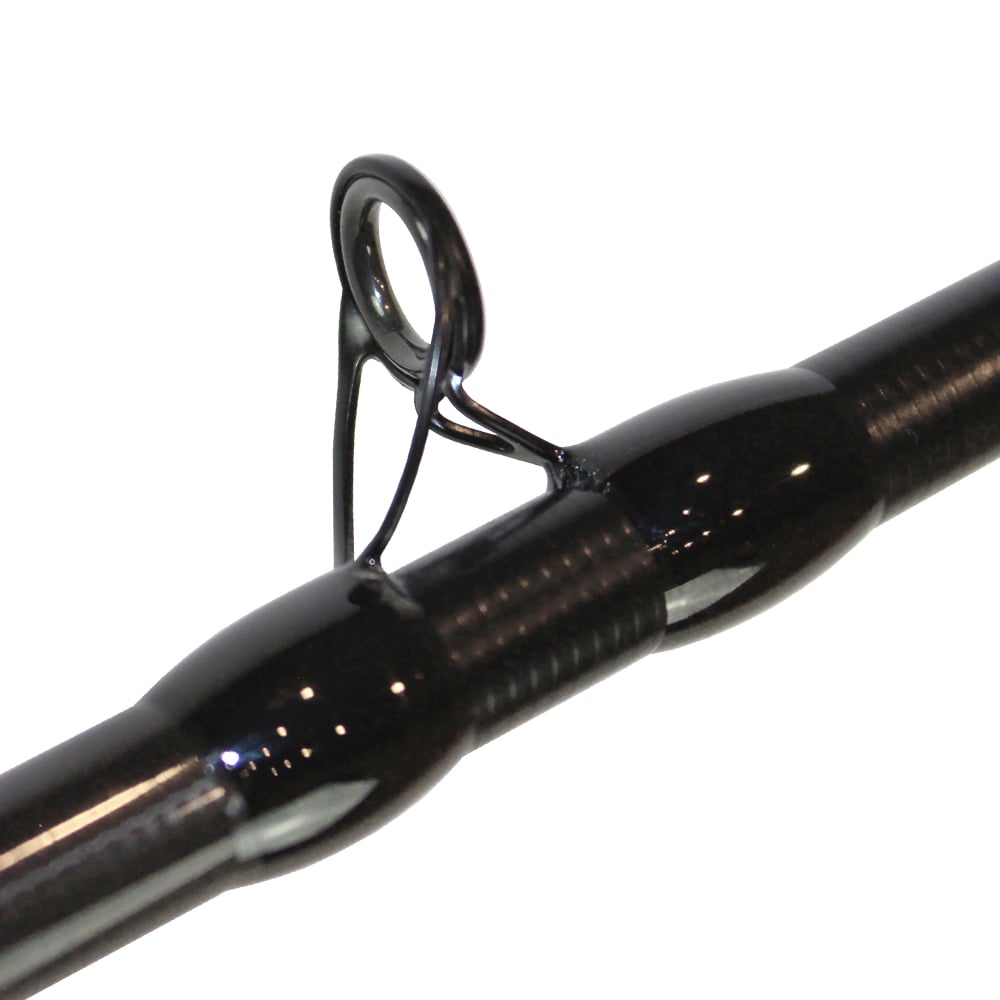 Close-up of a black fishing rod guide on the Dobyns Maverick Series Casting Rod 7'3" Medium Heavy (MK 733C) by americanlegacyfishing, featuring a circular metal loop attached to the rod. This medium-heavy guide is designed to support and direct the fishing line along the rod's length.