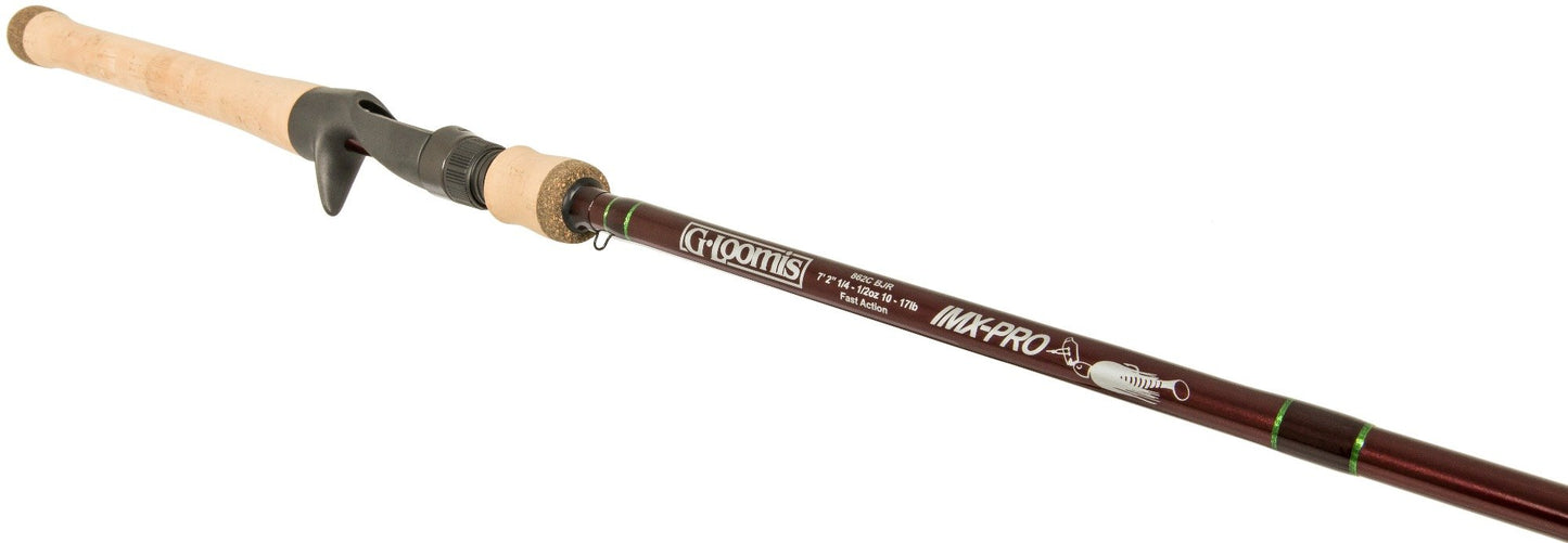 The americanlegacyfishing G. Loomis IMX-PRO Bladed Jig 883C BJR 7'4" Medium Heavy Casting Rod features a red-brown finish, cork handle, hook holder, and green accents. It's perfect for casting or fly fishing with a 7 wt line.