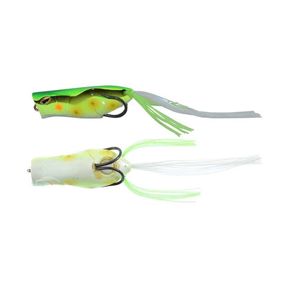 Displayed are two frog-shaped lures ideal for bass fishing. The top lure, similar to a Jackall Gavacho Frog by Jackall, is green with black eyes and red mouth, providing long-distance casting. The bottom lure is white with yellow accents and lime green rubber strands.