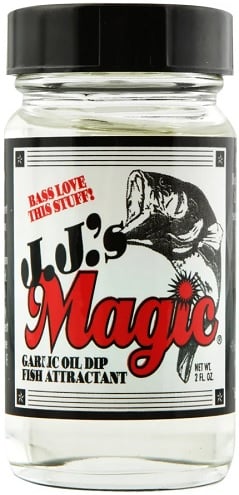 JJ's Magic Dippin' Dye with Garlic Oil is perfect for soft plastic baits. The label features a fish illustration stating "Bass Love This Stuff!" and contains 2 fluid ounces of irresistible fish attractant.