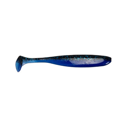 A fishing lure featuring a shiny, speckled surface in blue and black with a paddle tail. The Keitech Easy Shiner Swimbaits by Keitech offer a natural swimming action and streamlined shape, crafted to mimic the appearance of a small fish.