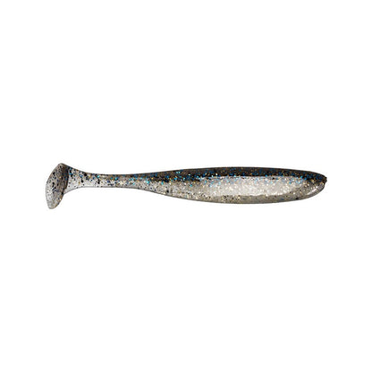 A close-up of the Keitech Easy Shiner Swimbaits by Keitech showcases its shiny, speckled body that transitions from silver to black. This lure features a paddle tail designed to replicate the natural swimming action and movement of fish in water.