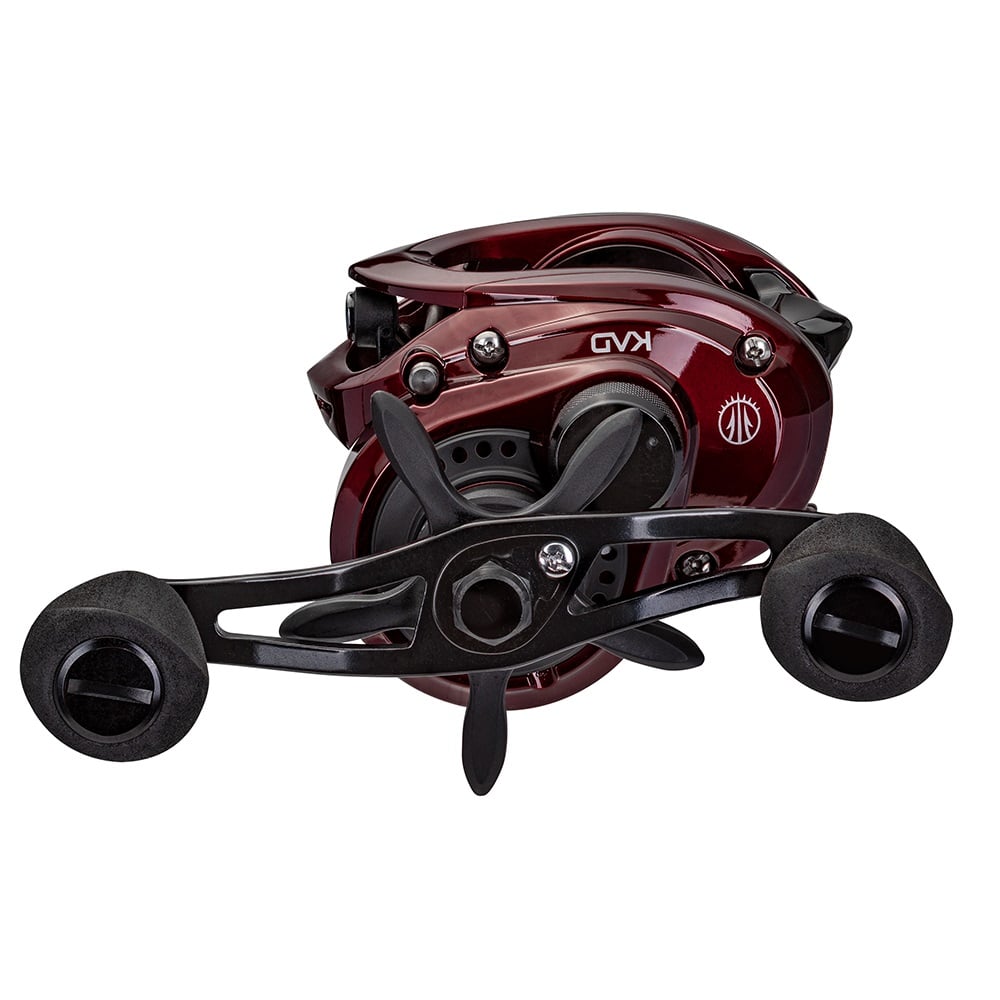 The Lew's KVD LFS Series Casting Reel in a dark red and black color scheme features a sleek design with dual handles, an aluminum frame, padded grips, and markings of "KVQ" along with a logo. This model from americanlegacyfishing is equipped with high-strength Speed Gears for optimal performance.