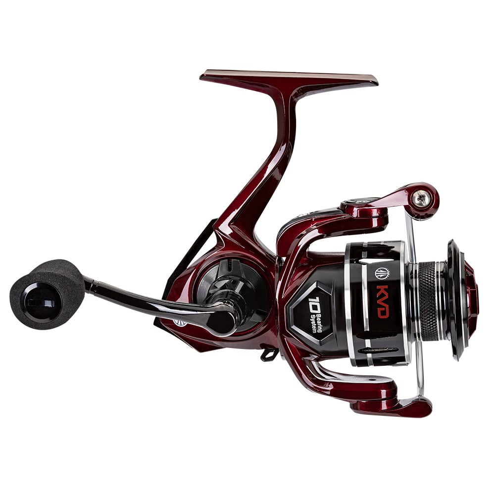 A close-up of the Lew's KVD Spinning Series Spinning Reel 6.2:1 (KVD300) from americanlegacyfishing highlights its sleek red and black design. This fishing reel features a premium bearing system and a smooth crank handle, with an aluminum frame displaying the "KVD" logo, all set against a pristine white background.