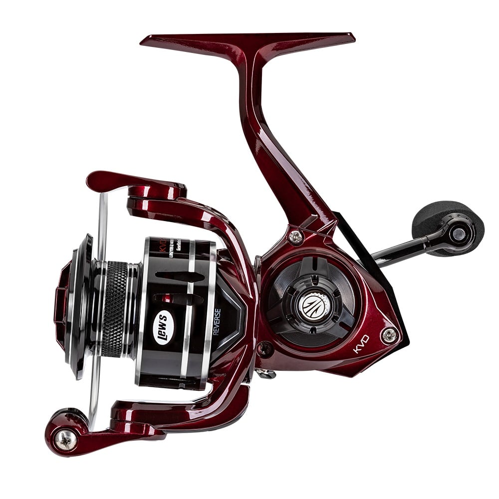 A close-up view of the Lew's KVD Spinning Series Spinning Reel 6.2:1 | KVD300 by americanlegacyfishing, featuring a shiny red and black finish with a premium bearing system. This fishing reel boasts a spinning mechanism, an aluminum frame, and a right-sided handle. Its sleek design with metallic accents is showcased against a white background.