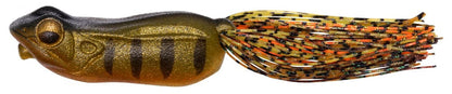 The Megabass Big Gabot Hollow Body Frog by Megabass has a small fish shape, bulbous head, elongated black and gold mottled body with stripes. Its splash-walking action is enhanced by thin, flexible tail strands in black, orange, and gold.