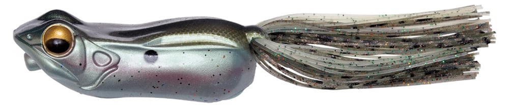 Discover the Megabass Big Gabot Hollow Body Frog by Megabass, a lifelike frog-shaped lure with a metallic gray body and golden eyes. Its custom hook guarantees precise snagging, while glittery tassels create splash-walking action mirroring a frog's leg movements.