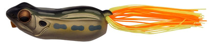 A detailed look at the Megabass Big Gabot Hollow Body Frog, showcasing its olive-green body with dark spots, distinct eyes, custom hook, and a tail of yellow and orange rubber strands for splash-walking action.