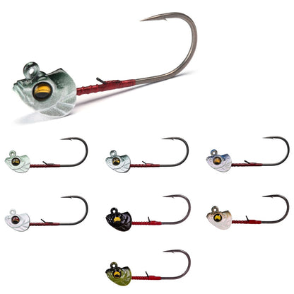 The Megabass Okashira Head collection includes eight jig heads with fish-like details and sharp hooks. Their hydrodynamic design, featuring eyes and textures, comes in colors like silver, green, black, and gold—ideal for finesse swimbaits.