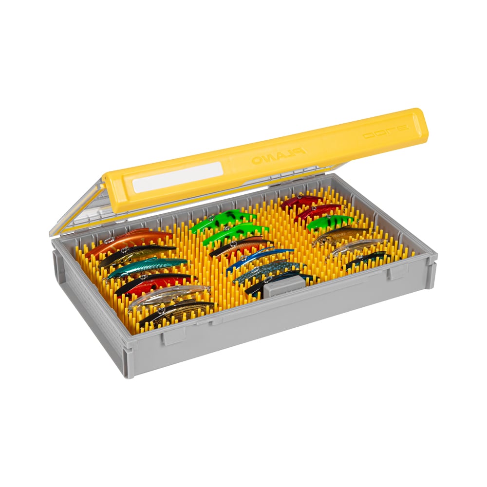 The Plano Edge Crankbait Small Box (PLASE500) by Plano features a gray box with a transparent yellow lid, showcasing neatly organized colorful fishing lures in individual compartments—an angler's ideal solution for efficient gear management.