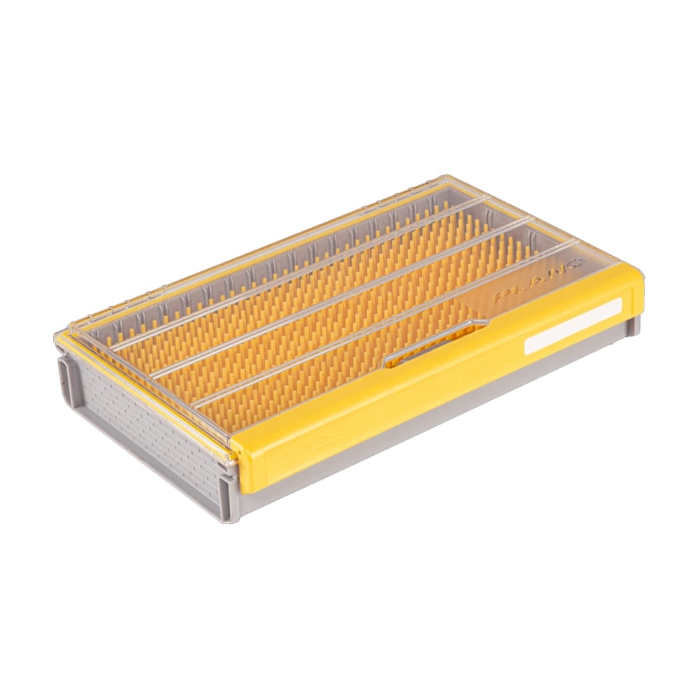 The Plano Edge Crankbait Small Box | PLASE500 is a rectangular, yellow and transparent tackle tray with a grid pattern for organizing. Ideal for anglers, it features a label slot on one side and fits perfectly within the Plano Edge Crankbait system.