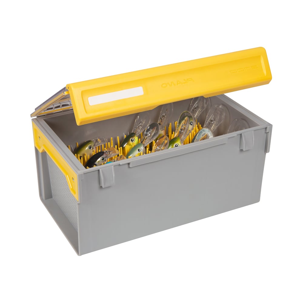 The Plano Edge Crankbait XL Box | PLASE503 features a gray exterior with a yellow lid, opening to reveal rows of fishing lures inside. This tackle storage system from Plano's EDGE series keeps your gear organized for your next fishing trip.