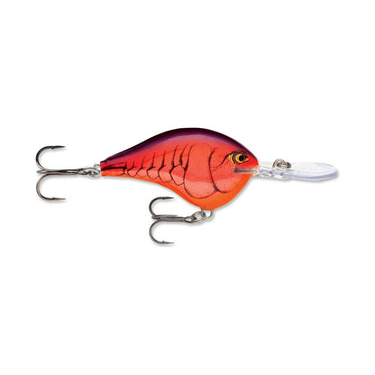 This Rapala DT Series Crankbait, available in a red and orange color scheme, is made from balsa wood and exhibits fish scale patterns. It includes a small diving lip and two treble hooks, delivering a crankbait action characteristic of the famed Rapala brand.