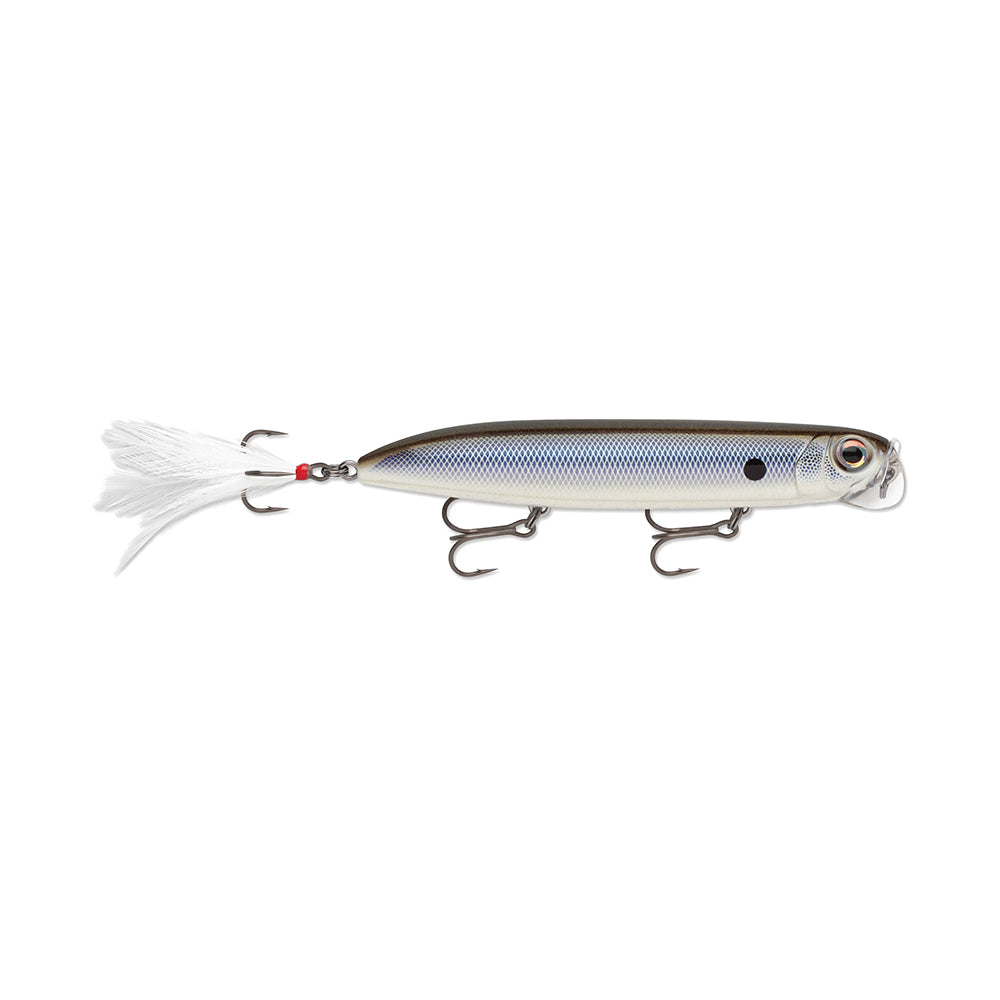 The Rapala PXR Jowler lure by Rapala sports a silver/black finish, features three VMC RedLine Series treble hooks and a white feather tail, imitates fish with realistic eyes and a streamlined body, creating surface disturbances to attract fish.