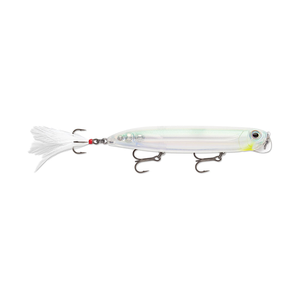 The Rapala PXR Jowler from the Precision Xtreme Series is a transparent surface bait with a white feather tail and three silver treble hooks, set against a plain white background, featuring an eye-catching yellow eye detail.