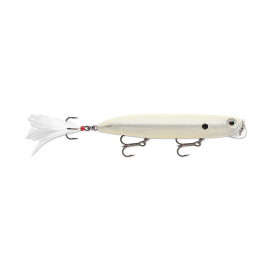 The Rapala PXR Jowler is a white surface lure from the Precision Xtreme Series, featuring two treble hooks, a feathered tail, and an eye design near the front for easy line attachment. Its streamlined cylindrical shape makes it an ideal choice for fishing.