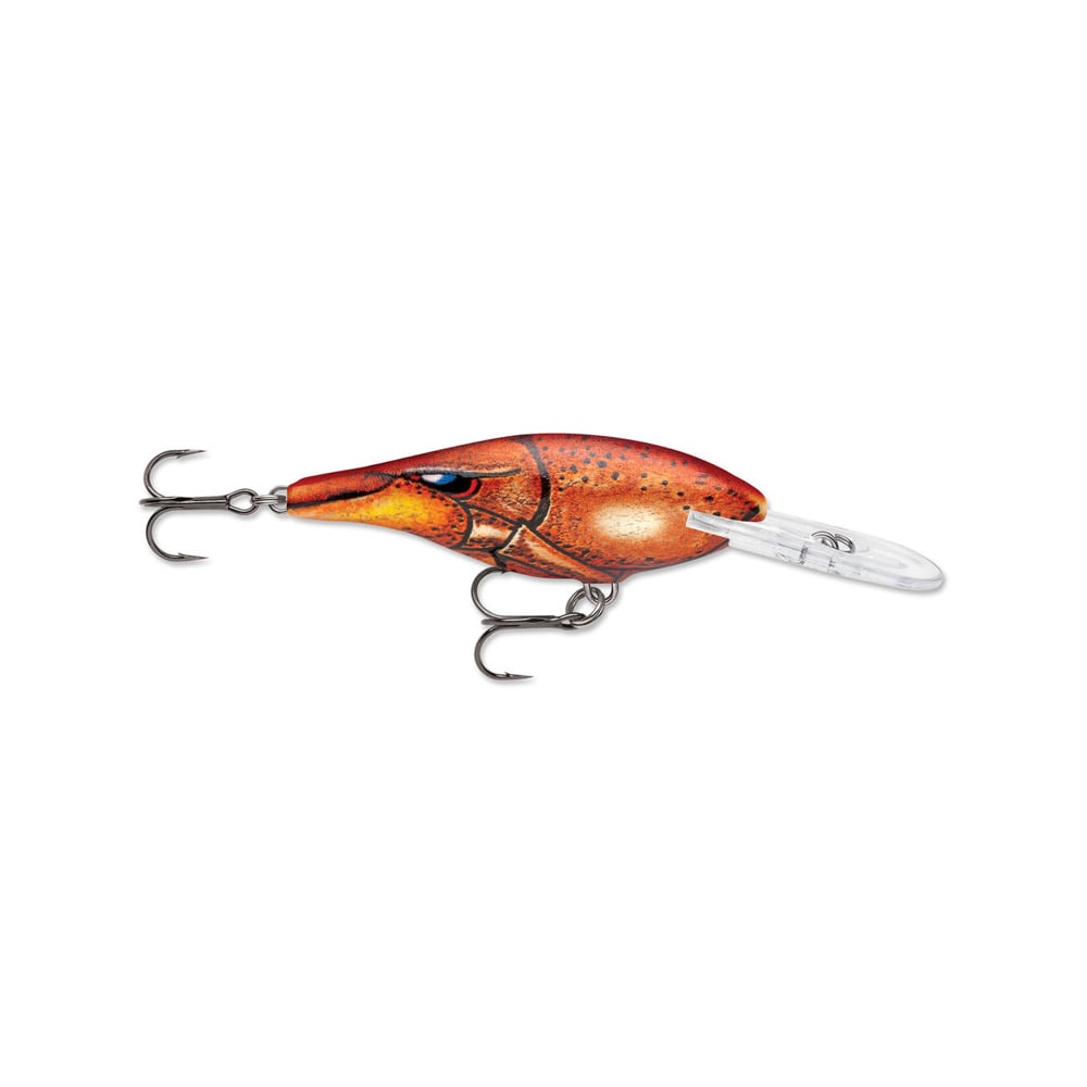 Discover the charm of Rapala's Shad Rap Crankbaits, expertly crafted featuring a brownish-orange body with scale detail. Designed like baitfish, it has two treble hooks and a transparent lip for irresistible diving action.