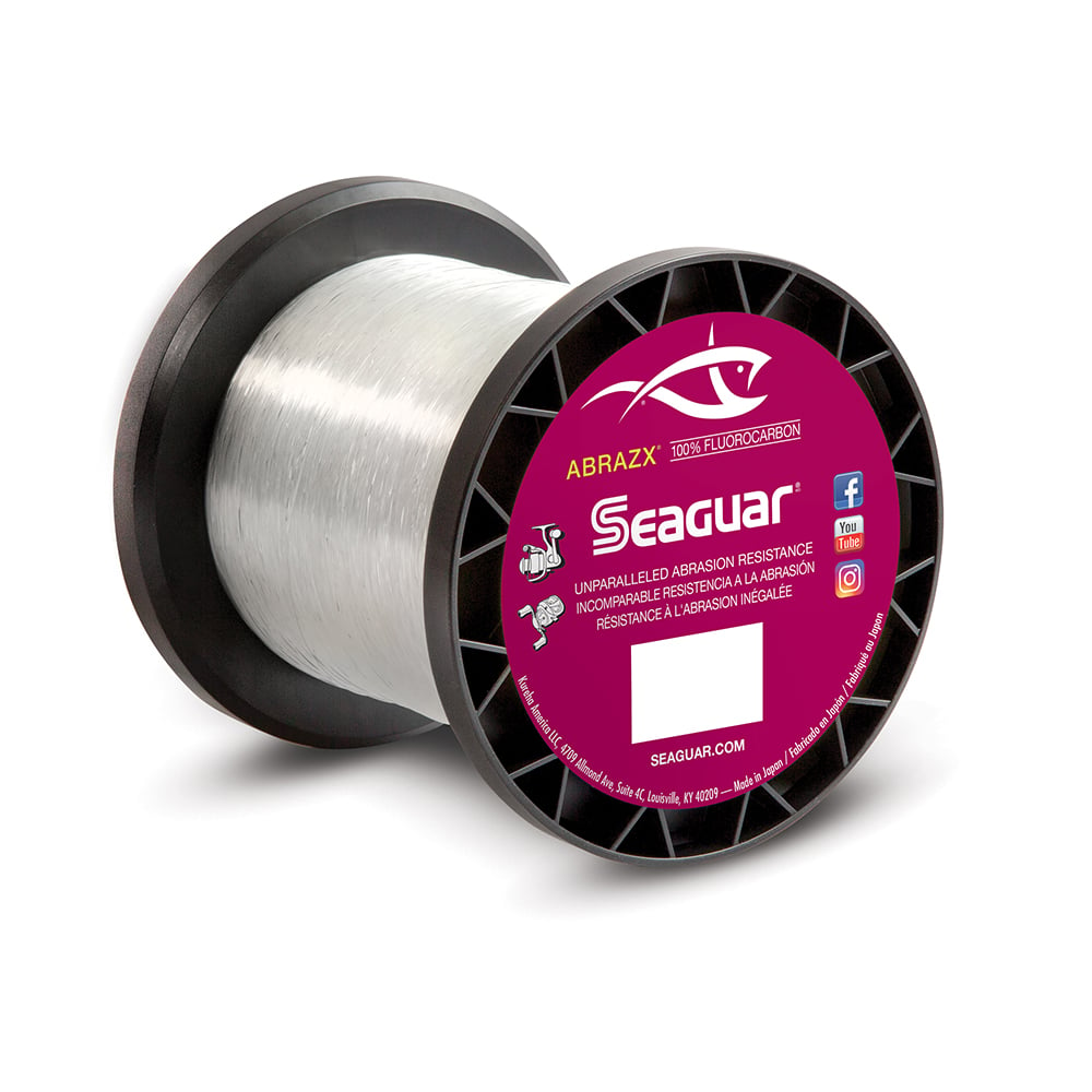 The Seaguar AbrazX Fluorocarbon Line features a black and pink label with a fish logo, emphasizing its unmatched abrasion resistance, ideal for heavy cover conditions.