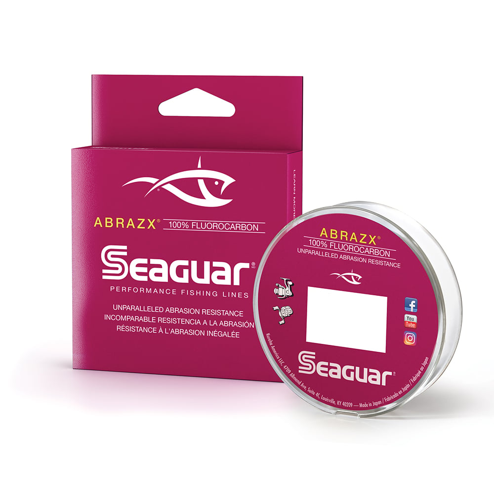 A maroon package with Seaguar's AbrazX Fluorocarbon Line showcases "unparalleled abrasion resistance" in various languages, featuring white text and a stylized fish logo—ideal for handling heavy cover effortlessly.