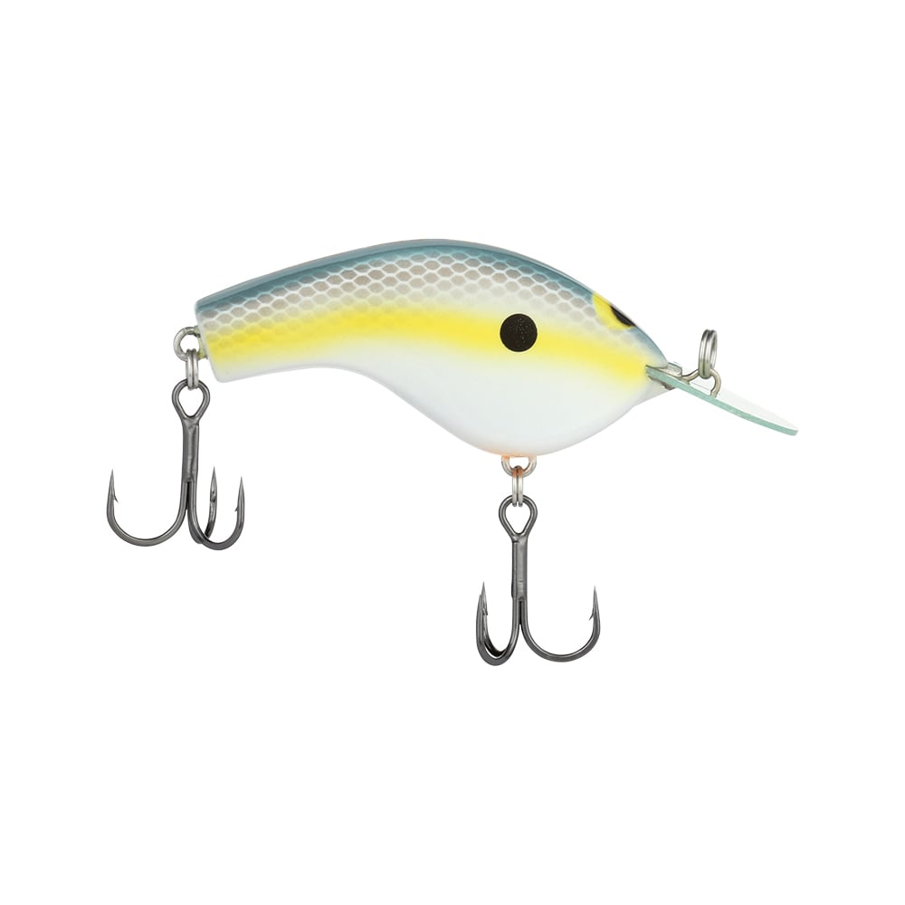 Introducing the Shimano Macbeth Flat Crankbait by Shimano, a fishing lure featuring a curved body and a vibrant blue-yellow gradient on top, designed with two treble hooks and a clear plastic lip for optimal diving. Enhanced with JET BOOST technology, it delivers precise action in the water.