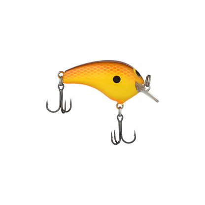 Introducing the Shimano Macbeth Tiny Crankbait, a fishing lure made by Shimano that boasts an orange and yellow body accented with black spots. It is equipped with two treble hooks—positioned on the bottom and rear—to mimic a small fish or bait, bringing finesse to every angling outing.