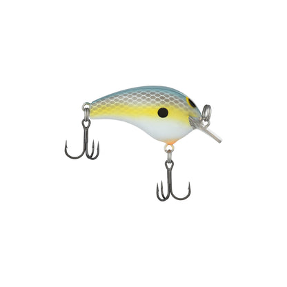 The Shimano Macbeth Tiny Crankbait, designed by Shimano, showcases a striking blue and yellow gradient body accented by a black dot towards the front. It comes equipped with two treble hooks and a clear plastic lip for diving, making it an ideal finesse crankbait for your upcoming fishing trip.