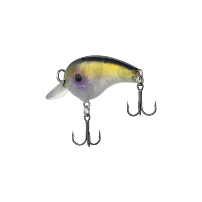 This Shimano Macbeth Tiny Crankbait showcases a translucent body with a gradient color transition from dark on top to light underneath. It comes equipped with two treble hooks and features an angled lip at the front to enhance its action.