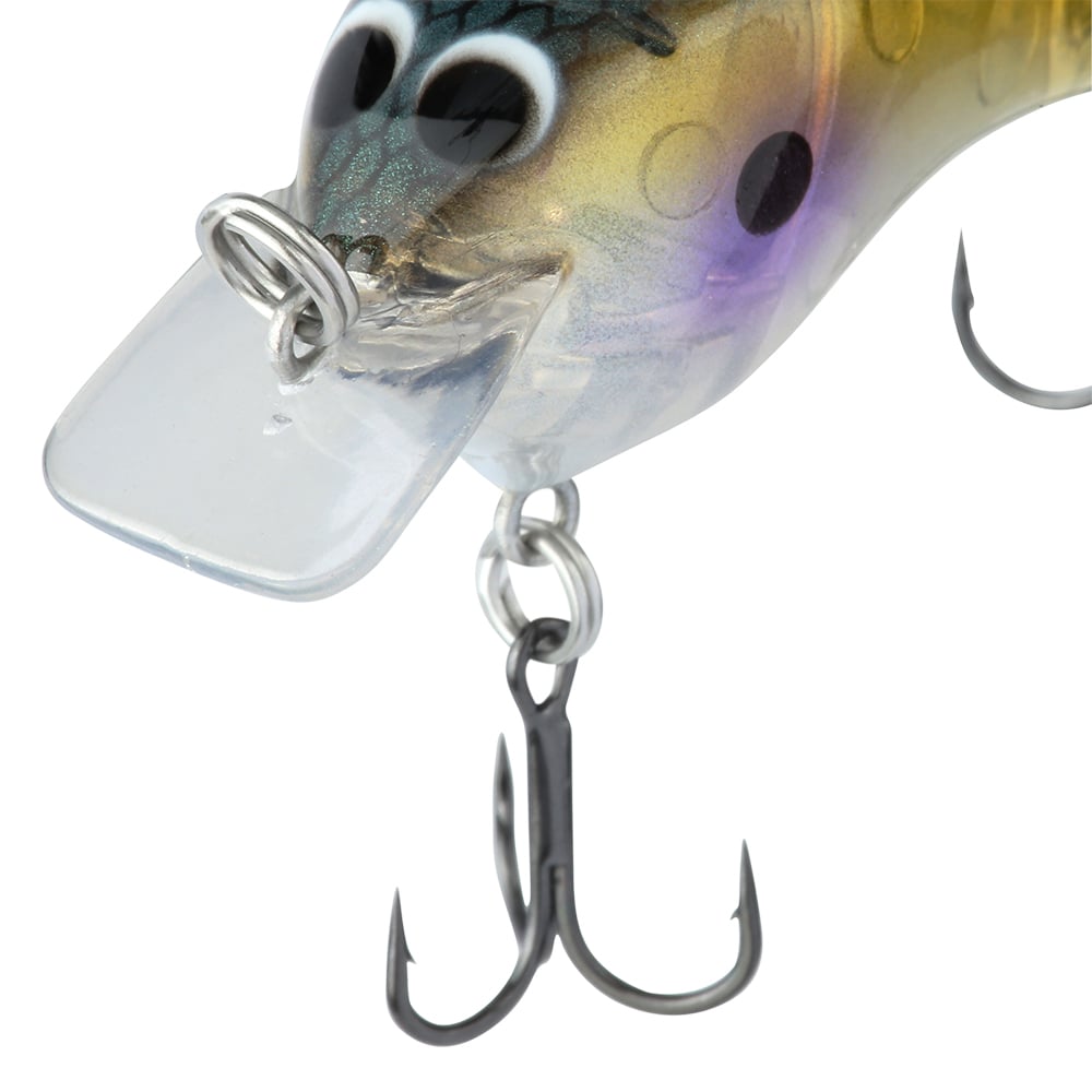 Close-up image of the Shimano Macbeth Tiny Crankbait by Shimano, highlighting its vibrant fish-like design with prominent eyes and a glossy finish. It is equipped with a transparent plastic lip and a sturdy metal treble hook underneath. The lure's body exhibits a captivating gradient of yellow, green, and purple colors for an irresistible finesse appeal.