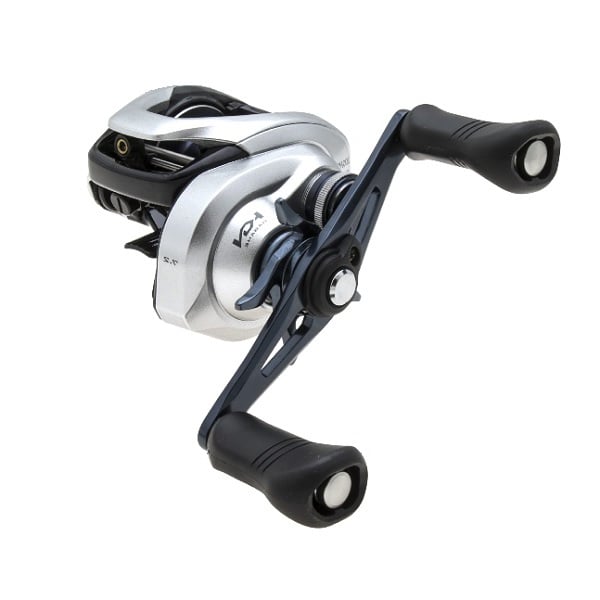 Introducing the Shimano Tranx 201AHG, a sleek casting reel in silver and black featuring dual handles, ideal for saltwater environments. With its modern design, adjustable knobs, and visible gear mechanism, this left-hand casting reel from americanlegacyfishing is perfect for baitcasting enthusiasts seeking both reliability and style.