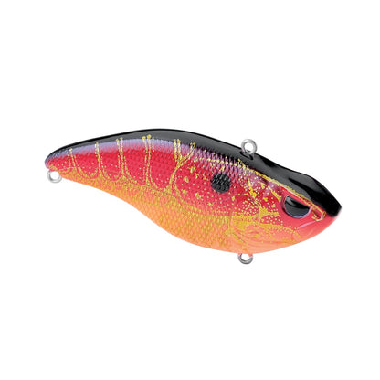 The SPRO Aruku Shad Silent is a vibrant, glossy lipless crankbait resembling a small fish. It features a red-to-orange gradient with yellow patterns and comes with sharp Gamakatsu treble hooks for reliable performance.